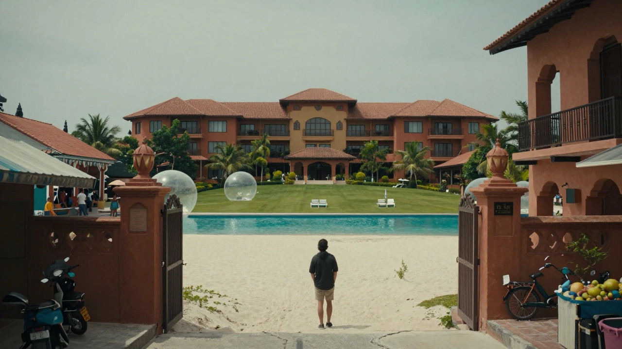 Traveler looking from resort boundary towards local town street